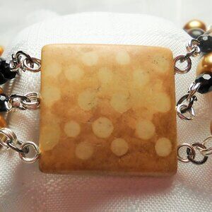 Beautiful 3 rows handmade bracelet with engraved elk bone beads
